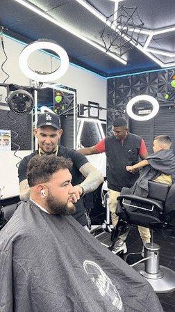 The Official La Perla Barbershop llc