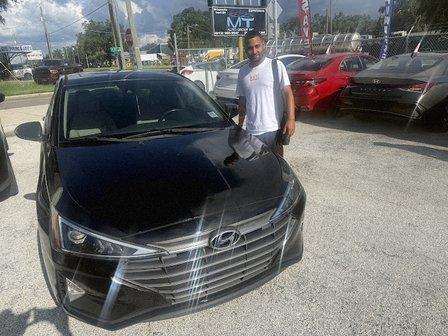 MT AUTO GROUP INC