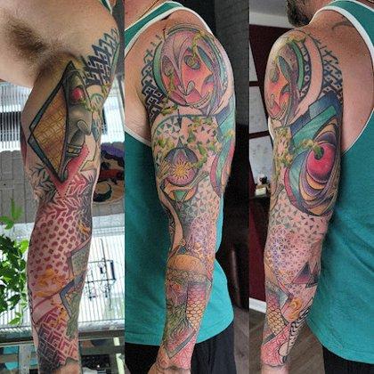 Over Omega Tattooing