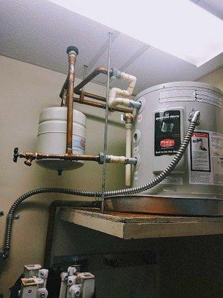 Woodman's Plumbing LLC