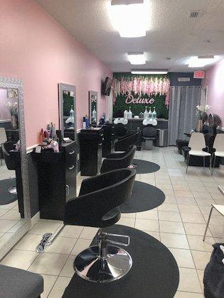 DELUXE BEAUTY SALON INC