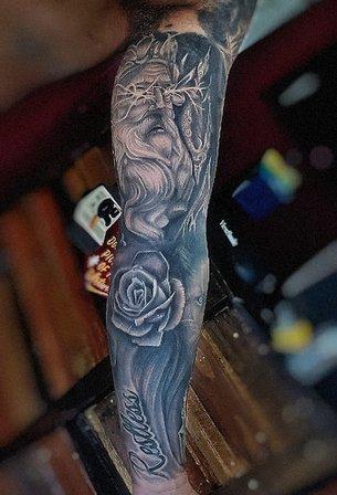 Above Alpha Tattooing