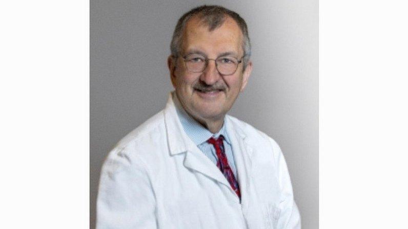 John P Deveikis, MD