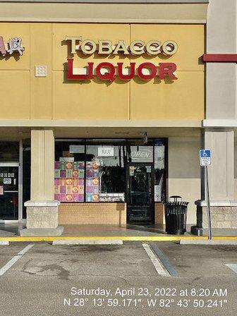 Quick King Tobacco And Liquor