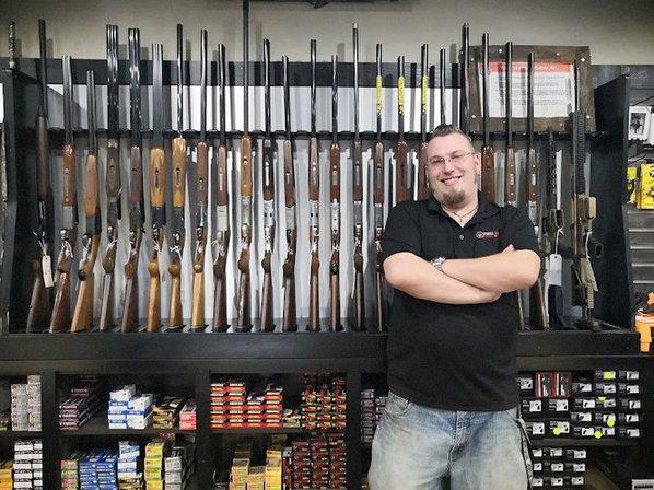 TOTAL IMPACT GUNS AND INDOOR RANGE