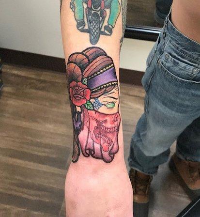 Lyons Den Tattoo Company