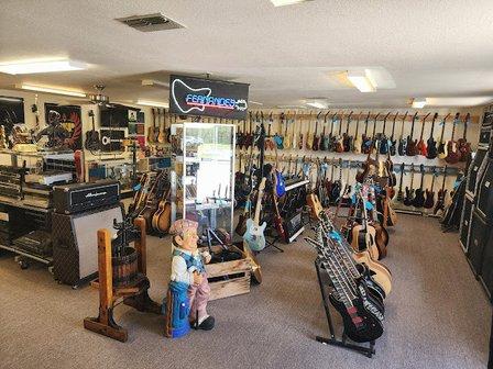 Backyard Guitars &Blue Collar Trading Post
