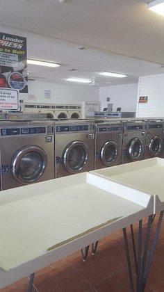 63RD AVE COIN LAUNDRY ATM INSIDE